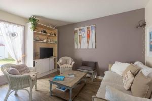 Χώρος καθιστικού στο Maison familiale la Noue