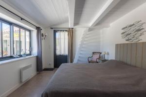 Katil atau katil-katil dalam bilik di Maison familiale la Noue