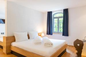 Postel nebo postele na pokoji v ubytování Hotel Sachsenklemme