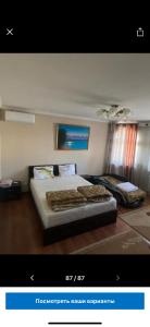 - une chambre avec 2 lits dans l'établissement Amanat Hostel Bishkek, à Bishkek