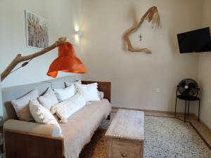 A bed or beds in a room at Mid century character house in Argostoli