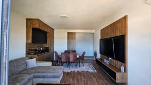 TV a/nebo společenská místnost v ubytování Apartman Gold.HD