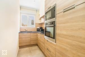 Kuchyň nebo kuchyňský kout v ubytování Villa Geminis by Abahana Villas