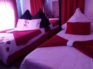 Giường trong phòng chung tại Maditselanyane Guest House
