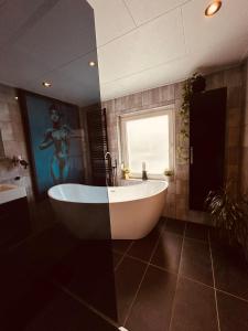 Φωτογραφία από το άλμπουμ του B&B Prachtig Allemachtig στο Βάλκενμπουργκ +20 φωτογραφίες