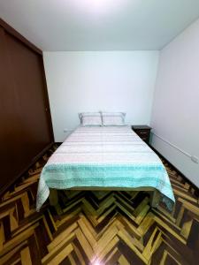 Casa Vallecito tesisinde bir odada yatak veya yataklar