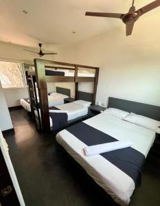 Ένα ή περισσότερα κρεβάτια σε δωμάτιο στο Hotel Aqualuna Departamento #aussiepipe