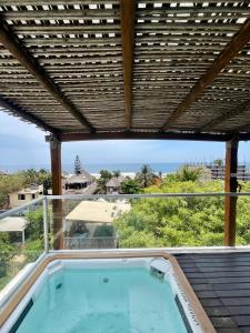Πισίνα στο ή κοντά στο Hotel Aqualuna Departamento #aussiepipe
