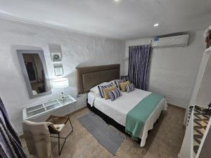 Postel nebo postele na pokoji v ubytování Design House Corrientes