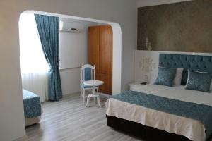 Llit o llits en una habitació de Beautiful 2+1 Apartments between Cleopatra Beach 1 and Harbor