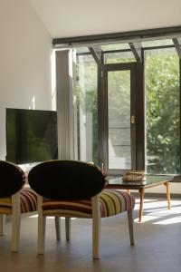 TV a/nebo společenská místnost v ubytování Lupinos San Martin de los Andes