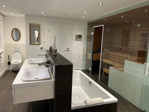 Koupelna v ubytování Traumwohnung mit eigenem Spa