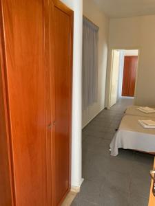 Postel nebo postele na pokoji v ubytování GR Apartments Sea View