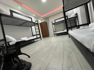 Voodi või voodid majutusasutuse Shesh Hostel toas