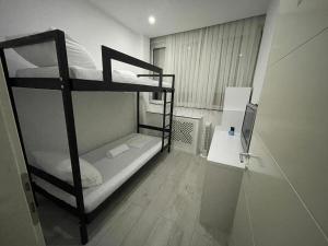 Voodi või voodid majutusasutuse Shesh Hostel toas