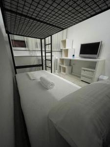 Voodi või voodid majutusasutuse Shesh Hostel toas