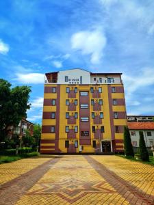 a yellow building with the word escape on it at Silver in Hunedoara