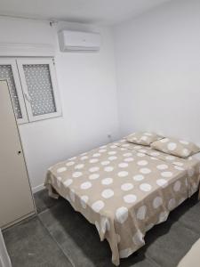 Postel nebo postele na pokoji v ubytování Valencia Ayora