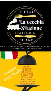 a poster for a theatre with a flag and a lamp at B&B Staziona e Dormi in Camigliatello Silano