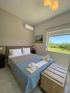 Postel nebo postele na pokoji v ubytování Stelios Studios Sougia + 35 fotografií