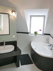 Kúpeľňa v ubytovaní Downtown Luxury apartman