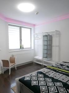 Posteľ alebo postele v izbe v ubytovaní Downtown Luxury apartman