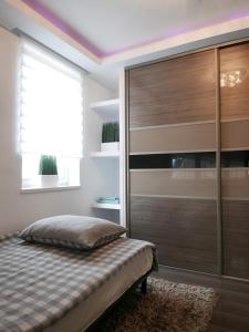 Posteľ alebo postele v izbe v ubytovaní Downtown Luxury apartman