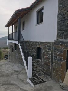 a building with a staircase on the side of it at Grande Vista Douro in Valença do Douro