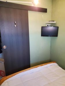 TV a/nebo společenská místnost v ubytování Leucate