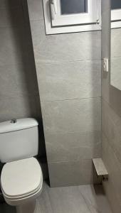 Koupelna v ubytování Apartamentos Playa + 12 fotografií