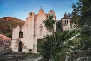 an old church on the side of a hill at Camere U Campanaru in Gratteri