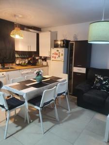 a kitchen and dining room with a table and chairs at CASA DE SILVA in Valladolid