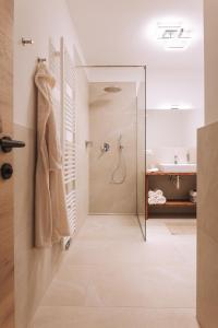a bathroom with a shower and a sink at Matscherhof Lana in Lana