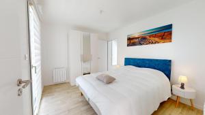 Postel nebo postele na pokoji v ubytování La Suite Brise Marine