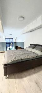 Ένα ή περισσότερα κρεβάτια σε δωμάτιο στο White loft