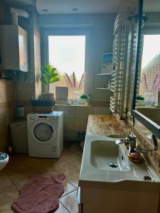 Koupelna v ubytování Apartament Muszelka