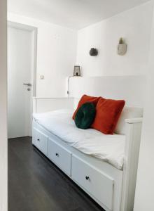 A bed or beds in a room at City Center Boutique Apartment