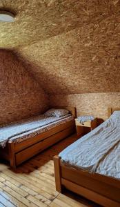 Postel nebo postele na pokoji v ubytování Cottage Uskoci