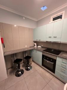 Kuchyň nebo kuchyňský kout v ubytování Danny's Seaside House