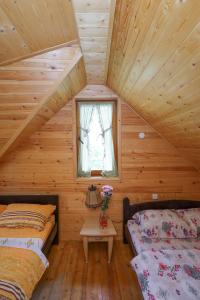 Postel nebo postele na pokoji v ubytování Drina Na Vodi