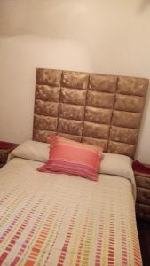 Ένα ή περισσότερα κρεβάτια σε δωμάτιο στο Apartamento Andalous