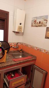 Η κουζίνα ή μικρή κουζίνα στο Apartamento Andalous