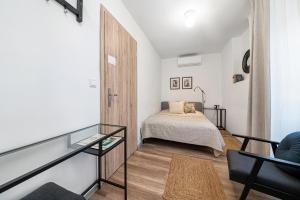 Posteľ alebo postele v izbe v ubytovaní BLAHA ROOMS