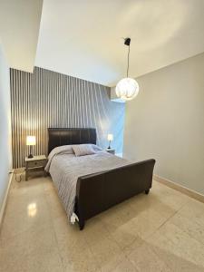 Кровать или кровати в номере Apartamento en Panamá, Yoo and Art en Avenida Balboa