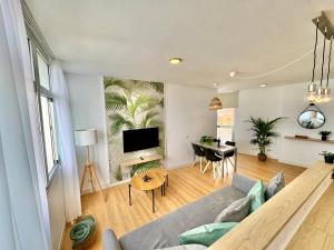 TV a/nebo společenská místnost v ubytování Lunamar Luxury Place