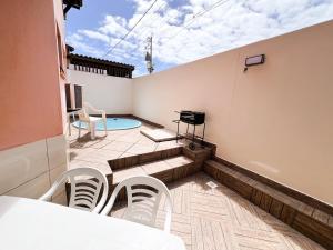 Πισίνα στο ή κοντά στο Village Itacimirim Praia da Espera rua7