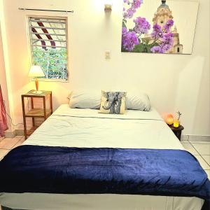Кровать или кровати в номере The Zen Den