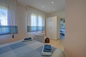 Postel nebo postele na pokoji v ubytování Alba Apartment