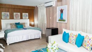Voodi või voodid majutusasutuse Guacamayos Hotel toas