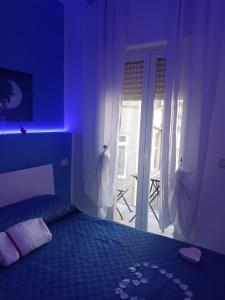 Postel nebo postele na pokoji v ubytování SUN & MOON B&B